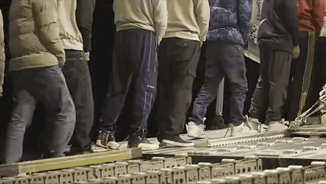 Migrant deported in chains